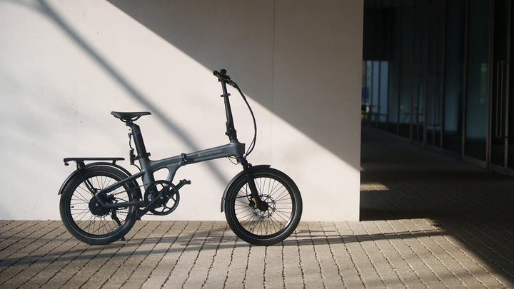 ADO Air 20 Ultra folding e-bike parked in grey
