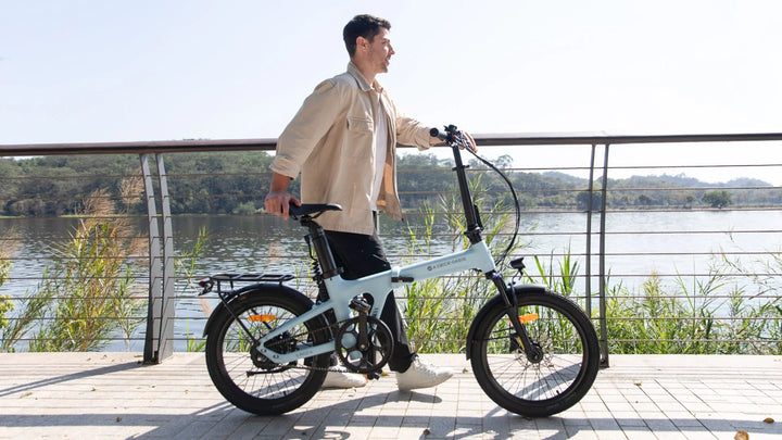Rider walking with the ADO Air 20 Ultra folding e-bike