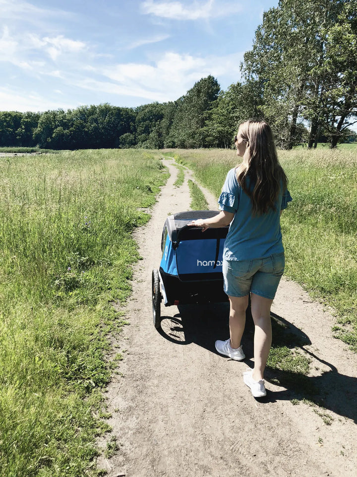 Hamax Traveller being used as a stroller on a path